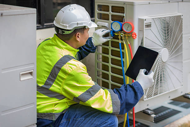 Professional Heat Pump Repair technician working in Liberty, TX